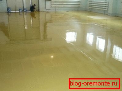 То је боја која олакшава завршетак бетонског пода у великој просторији. То је боја која олакшава завршетак бетонског пода у великој просторији.